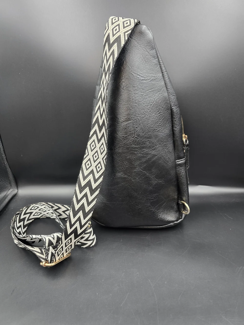 Black Studded Women's Leather Sling Backpack with Patterned Strap